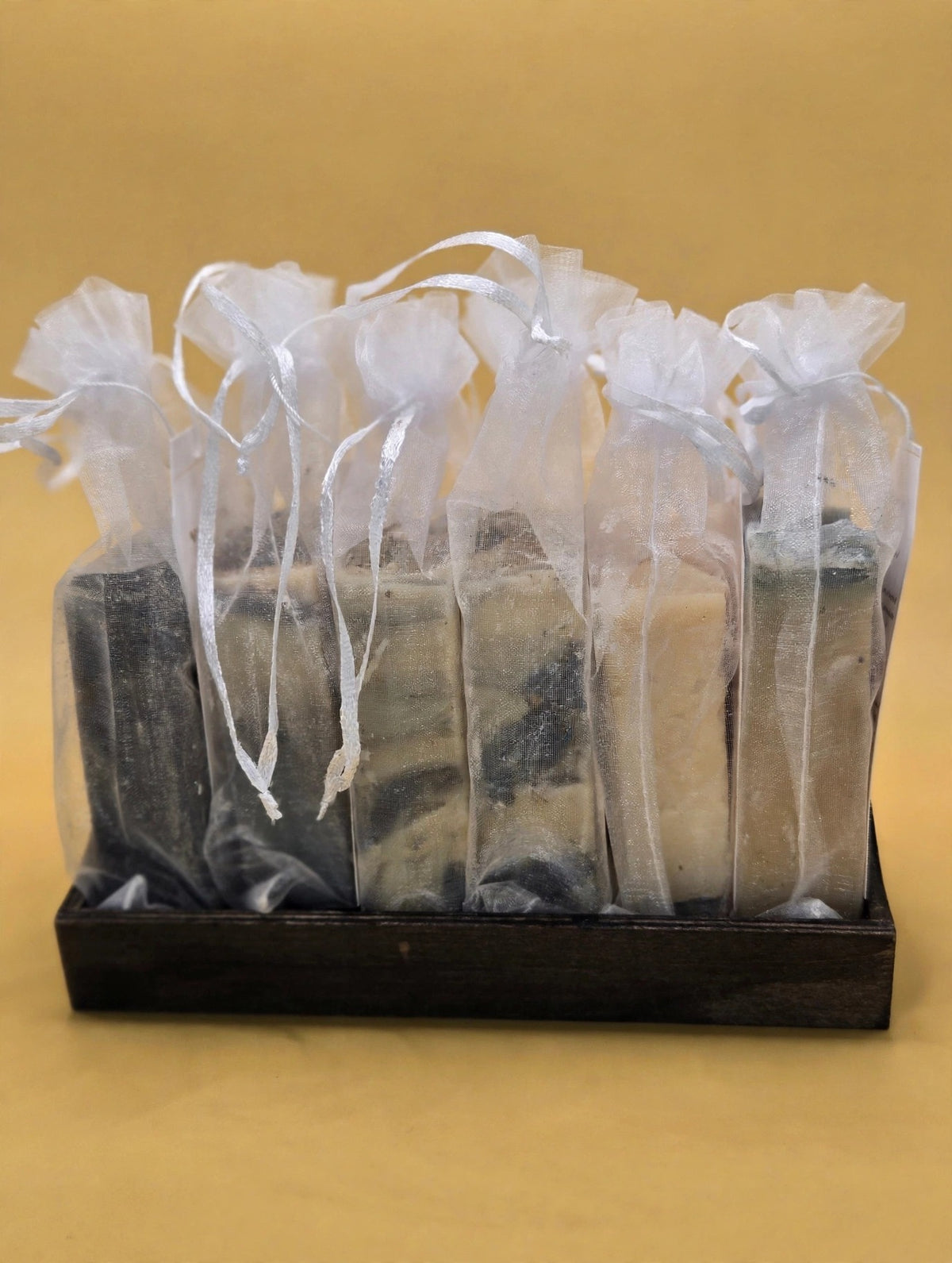 Six-Bar Soap Bundle on a gold background, main photo